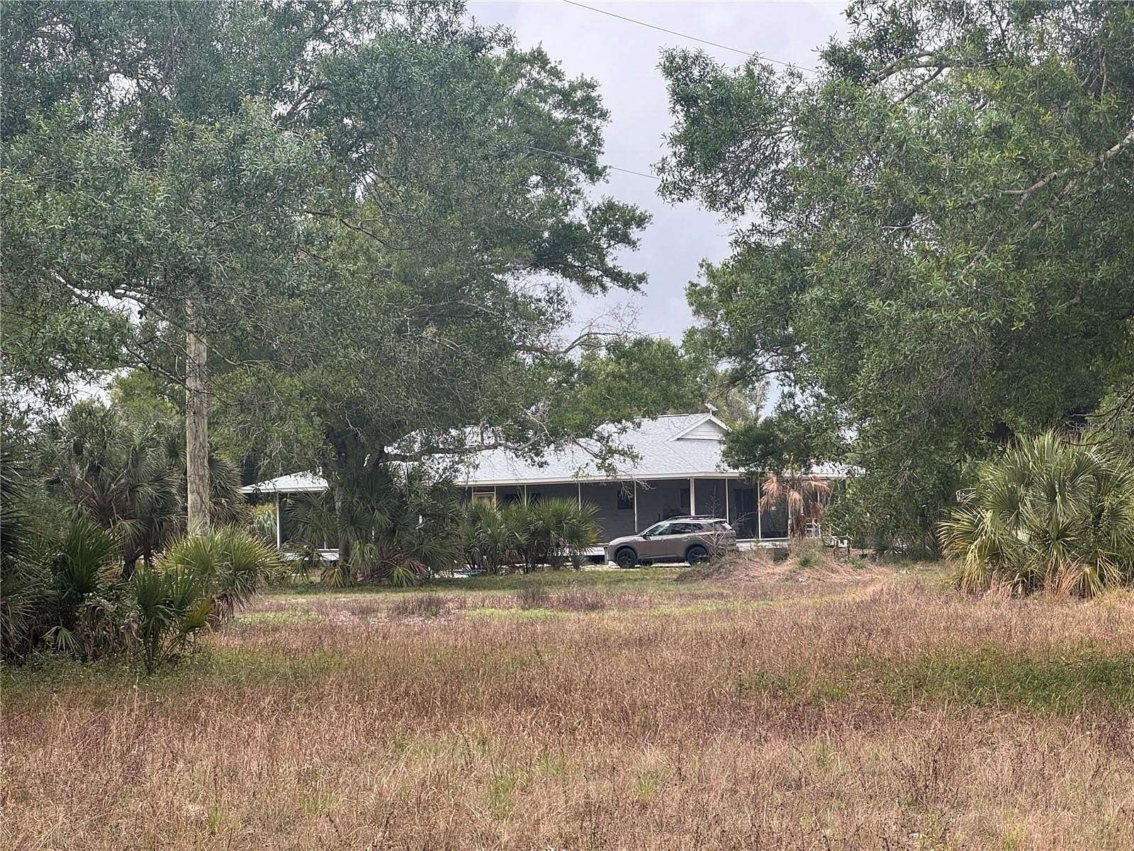 9.75 Acres of Land with Home for Sale in Arcadia, Florida