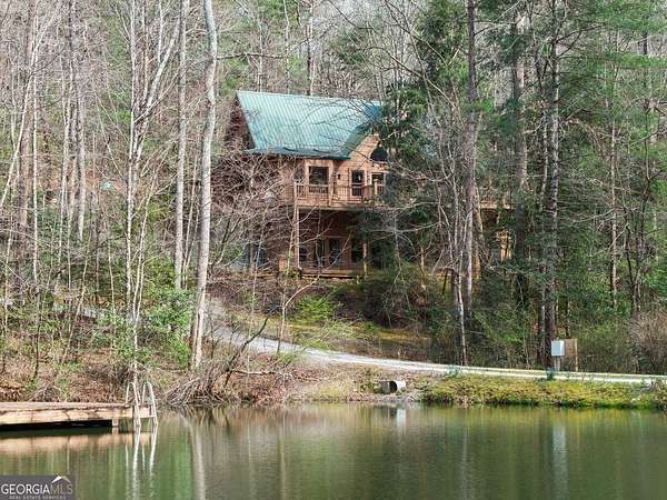 12.1 Acres of Land with Home for Sale in Clayton, Georgia