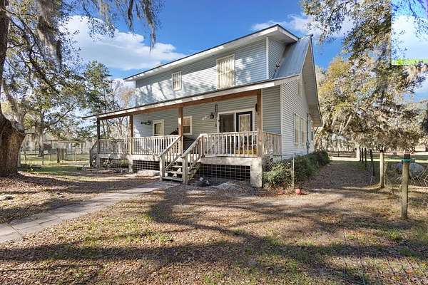 17.7 Acres of Land with Home for Sale in Cedar Key, Florida