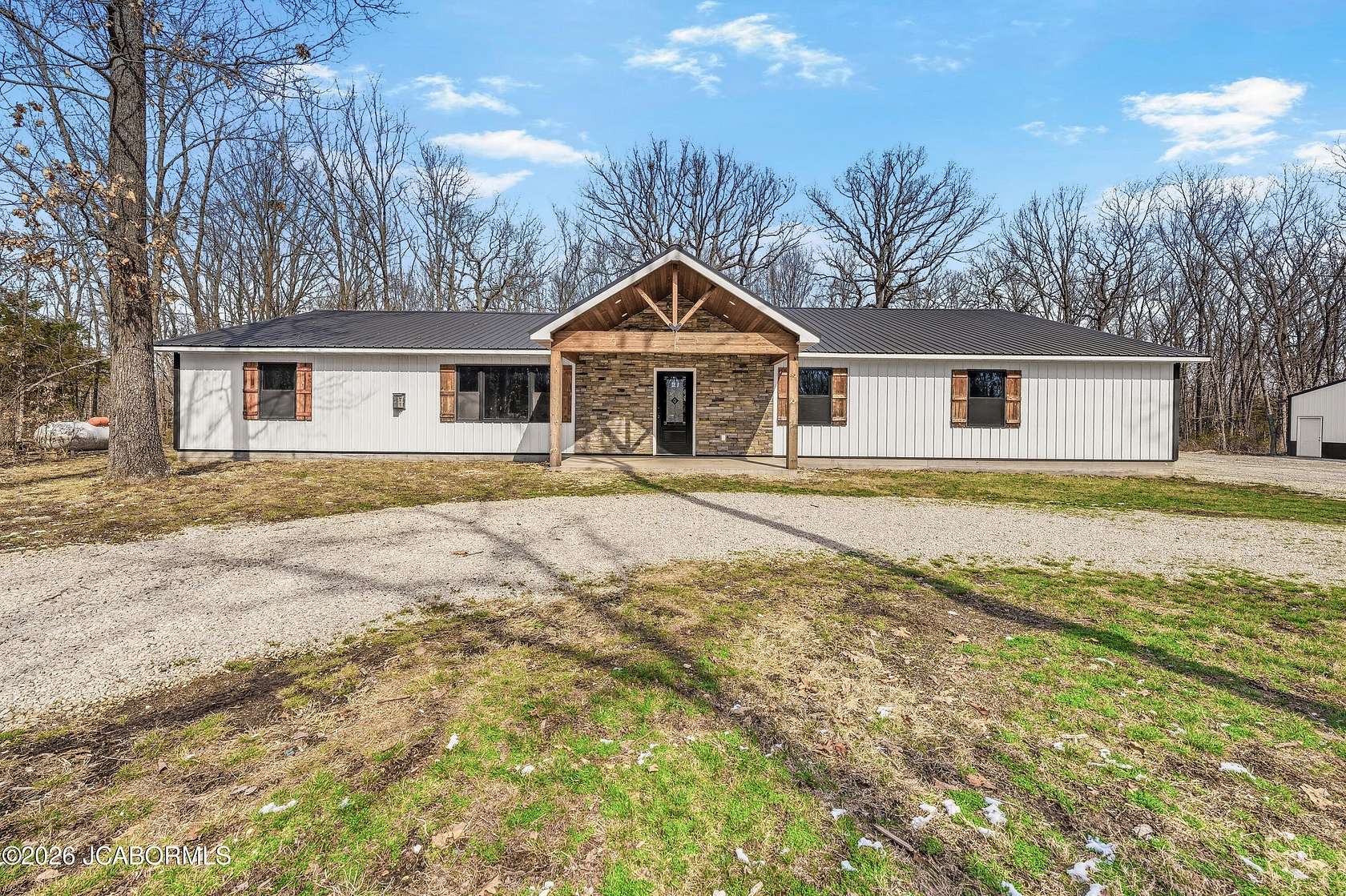 16.3 Acres of Recreational Land with Home for Sale in Stover, Missouri