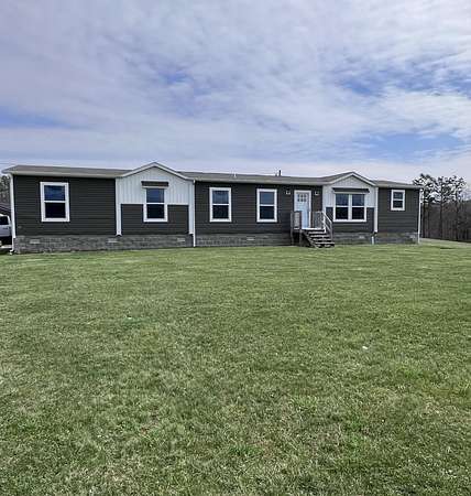 63 Acres of Land with Home for Sale in Beattyville, Kentucky