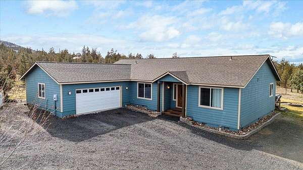 5 Acres of Land with Home for Sale in Powell Butte, Oregon