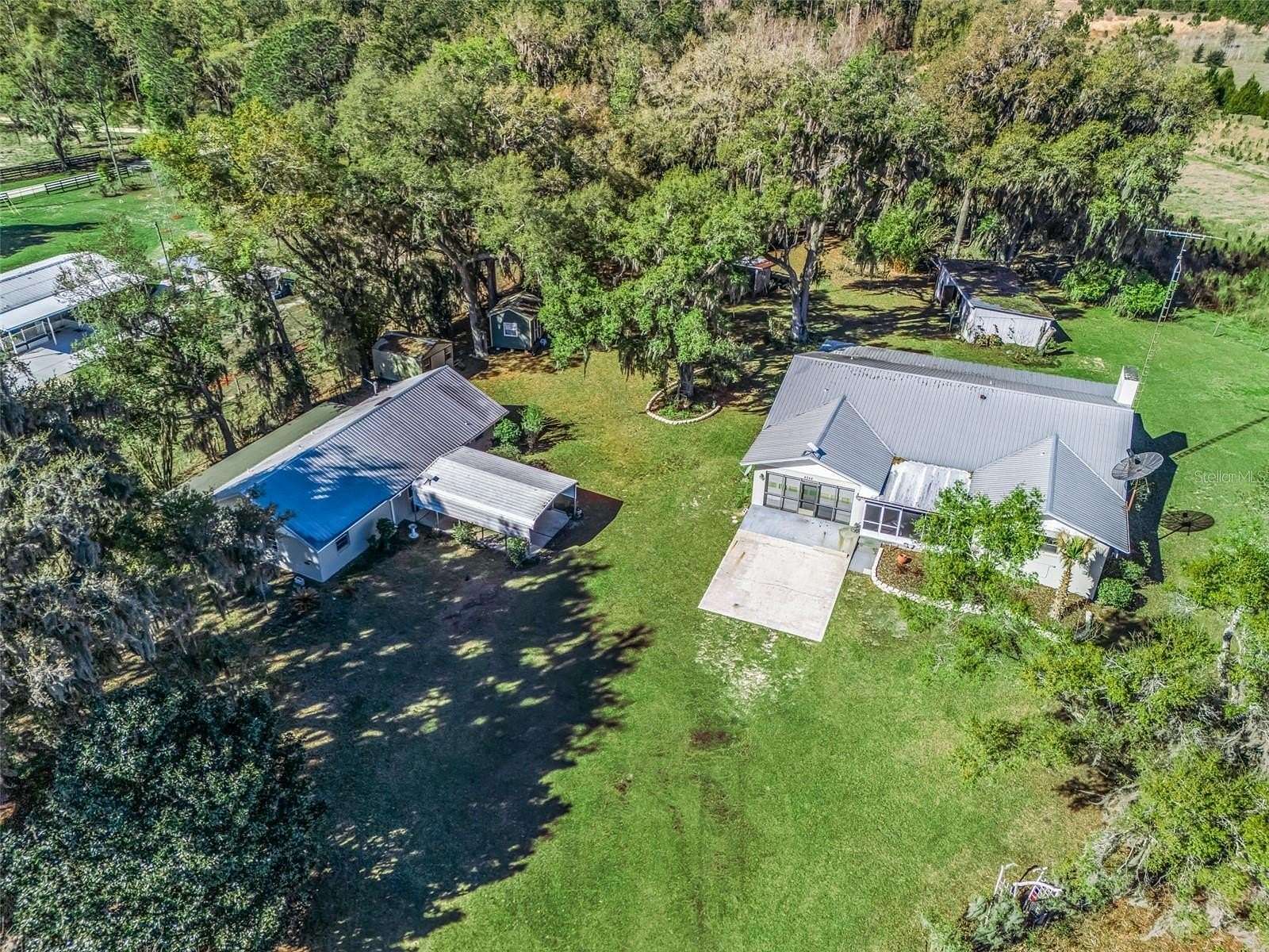 26.6 Acres of Land with Home for Sale in Bronson, Florida