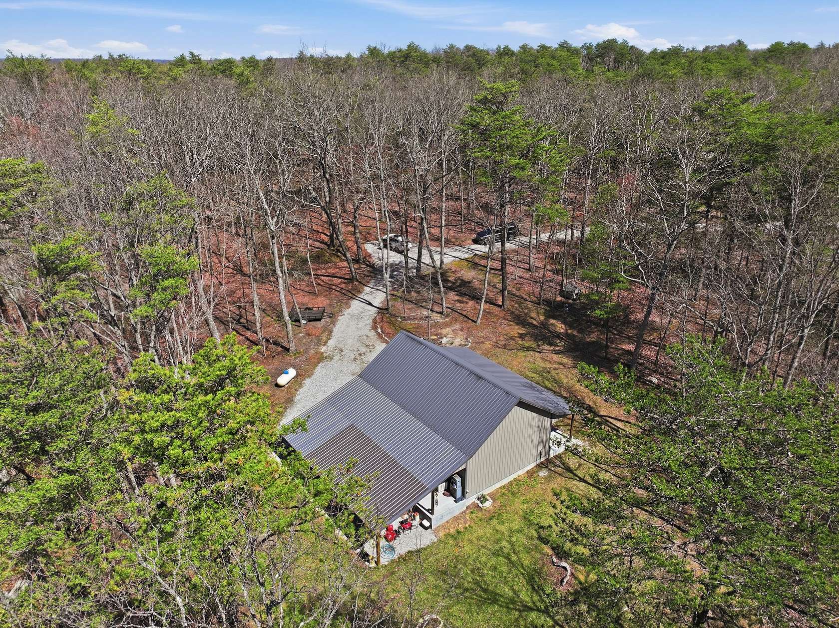 5.12 Acres of Land with Home for Sale in Pelham, Tennessee