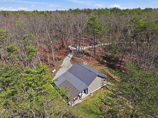 5.12 Acres of Land with Home for Sale in Pelham, Tennessee