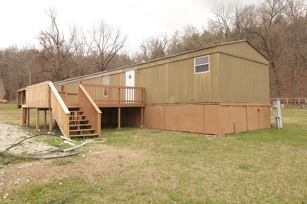 2.5 Acres of Land with Home for Sale in Taneyville, Missouri