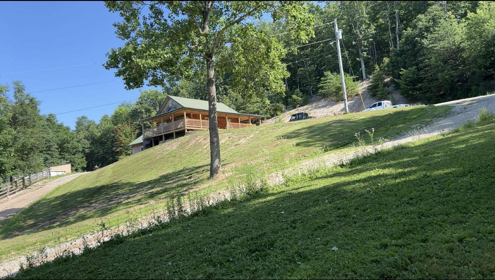 47 Acres of Land with Home for Sale in Tollesboro, Kentucky