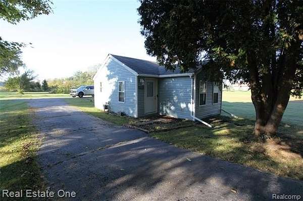 2 Acres of Land with Home for Sale in Monroe, Michigan