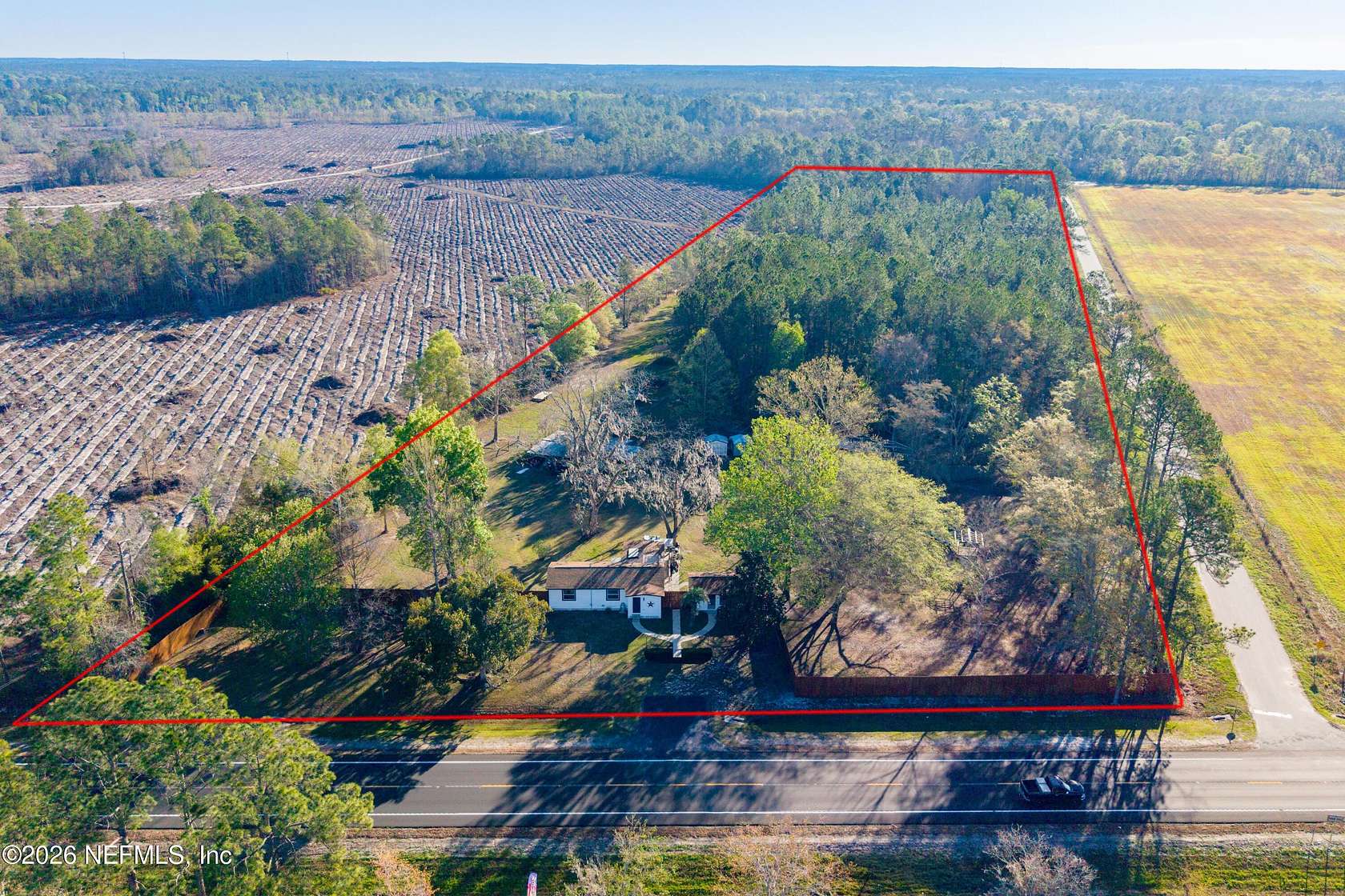 13.7 Acres of Land with Home for Sale in Starke, Florida
