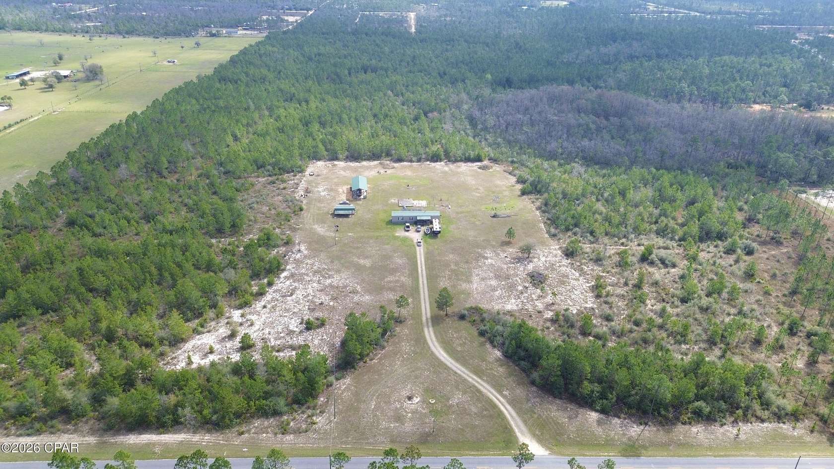 79.3 Acres of Land with Home for Sale in Fountain, Florida