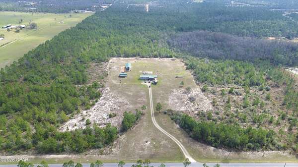 79.3 Acres of Land with Home for Sale in Fountain, Florida