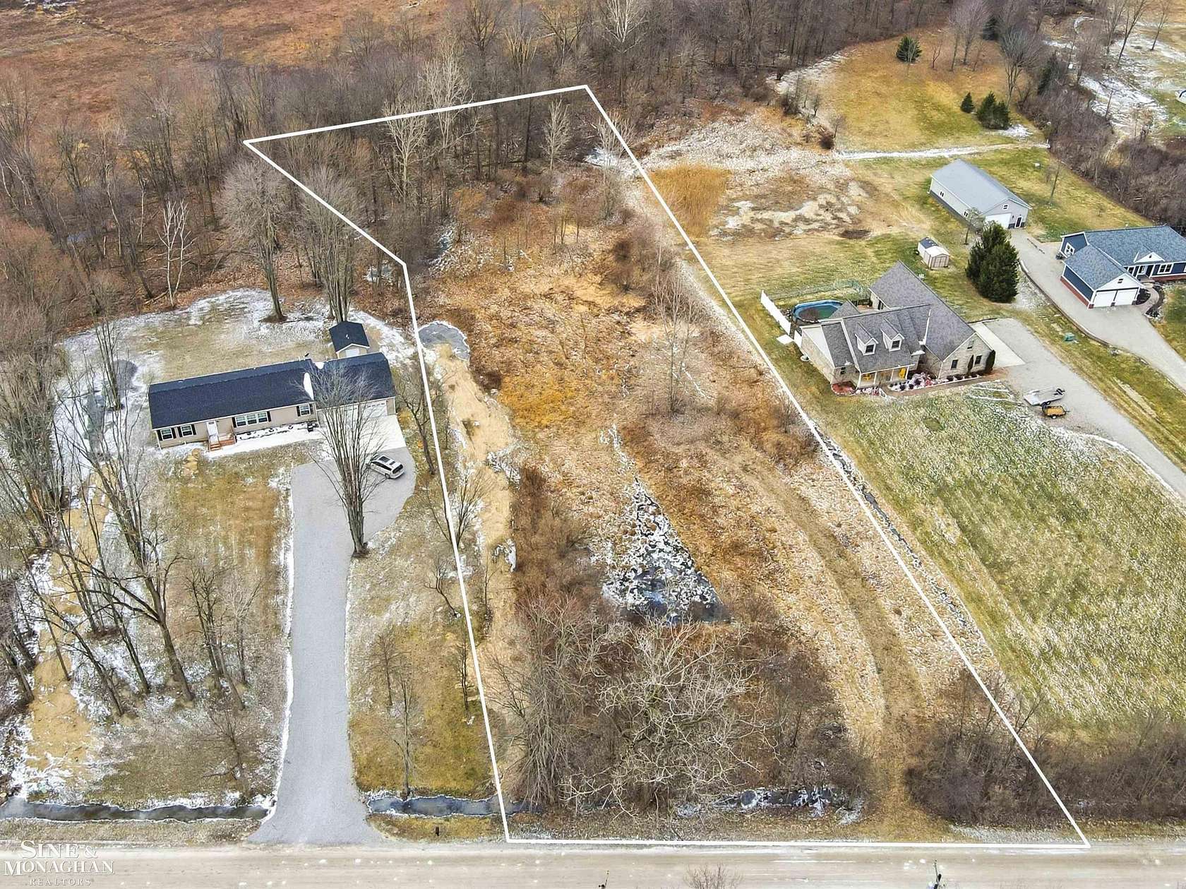 2 Acres of Residential Land for Sale in Adair, Michigan