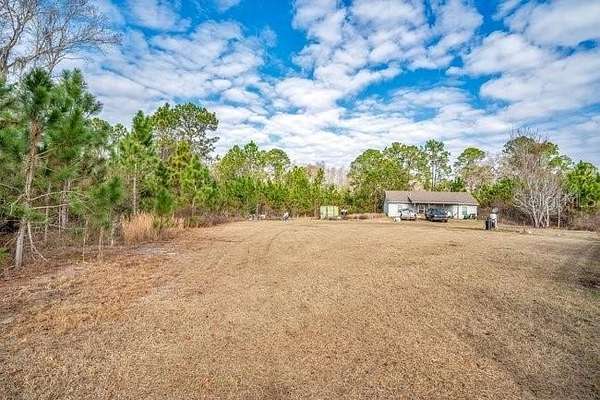 82.7 Acres of Land with Home for Sale in Groveland, Florida