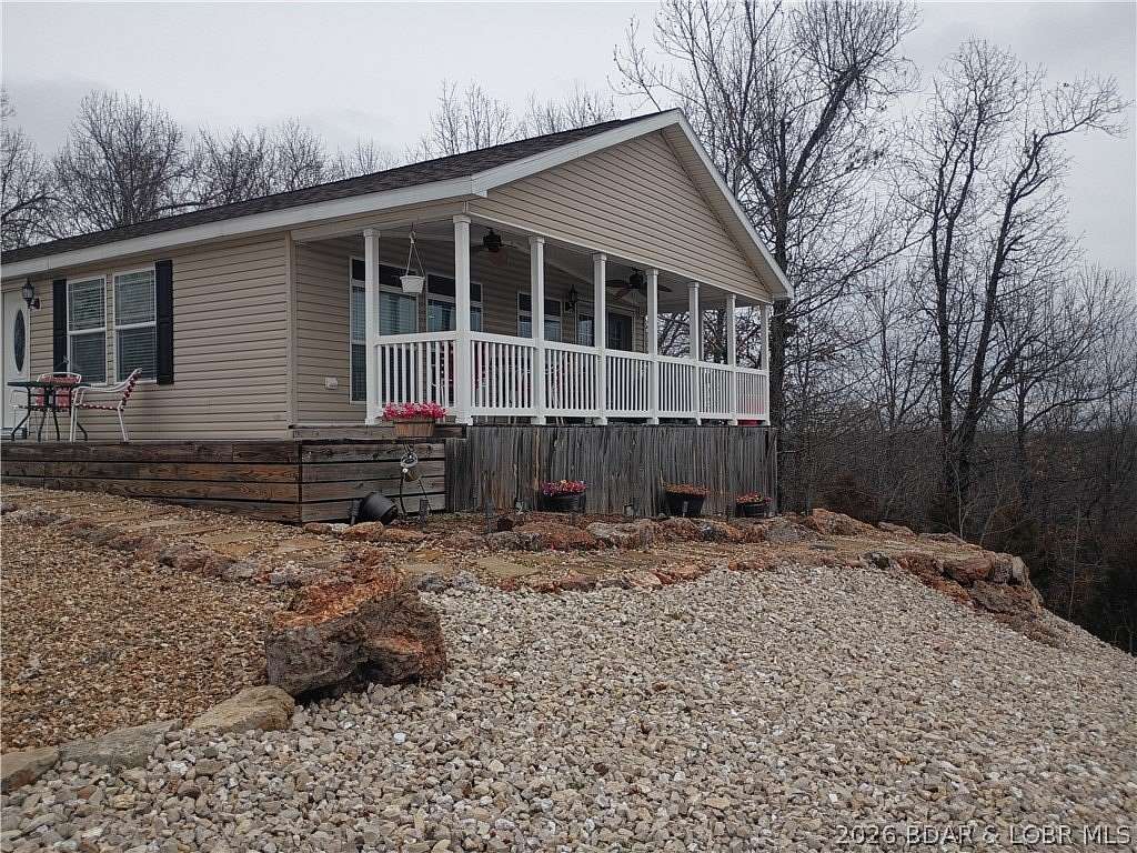 10.1 Acres of Land with Home for Sale in Sunrise Beach, Missouri
