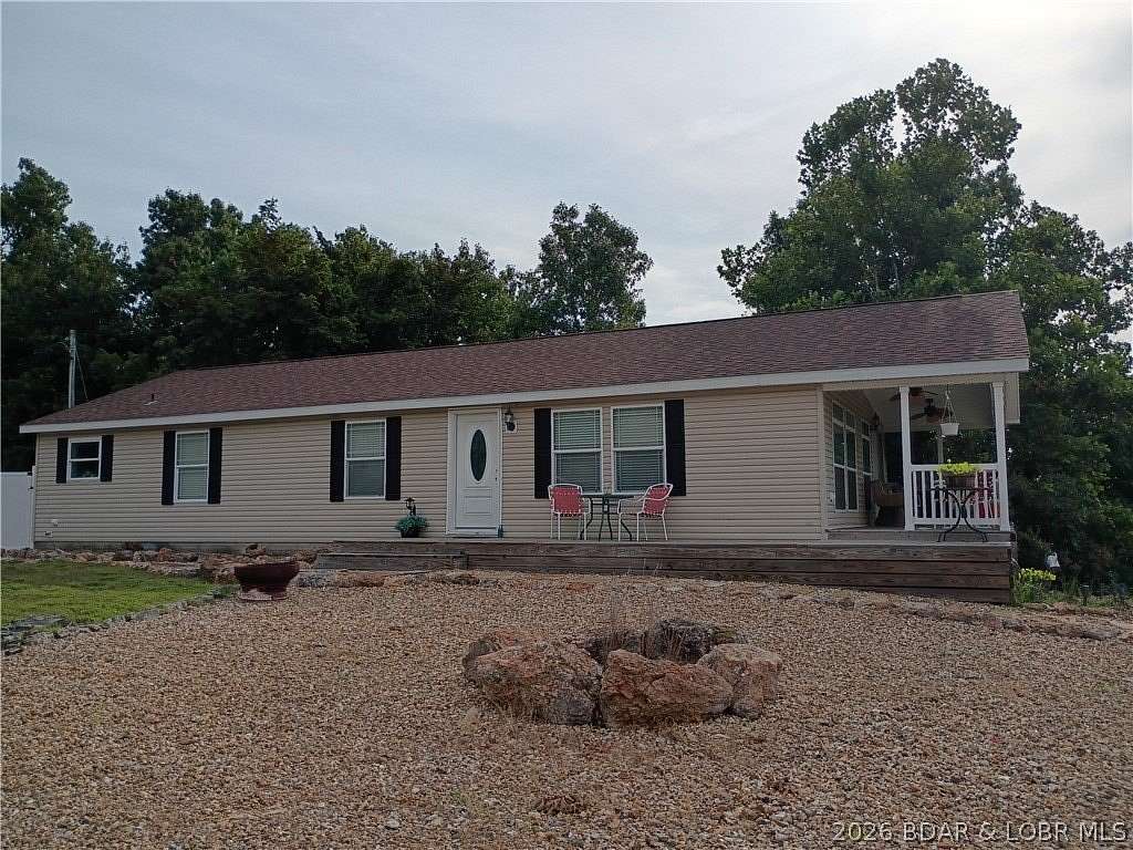 10.1 Acres of Land with Home for Sale in Sunrise Beach, Missouri