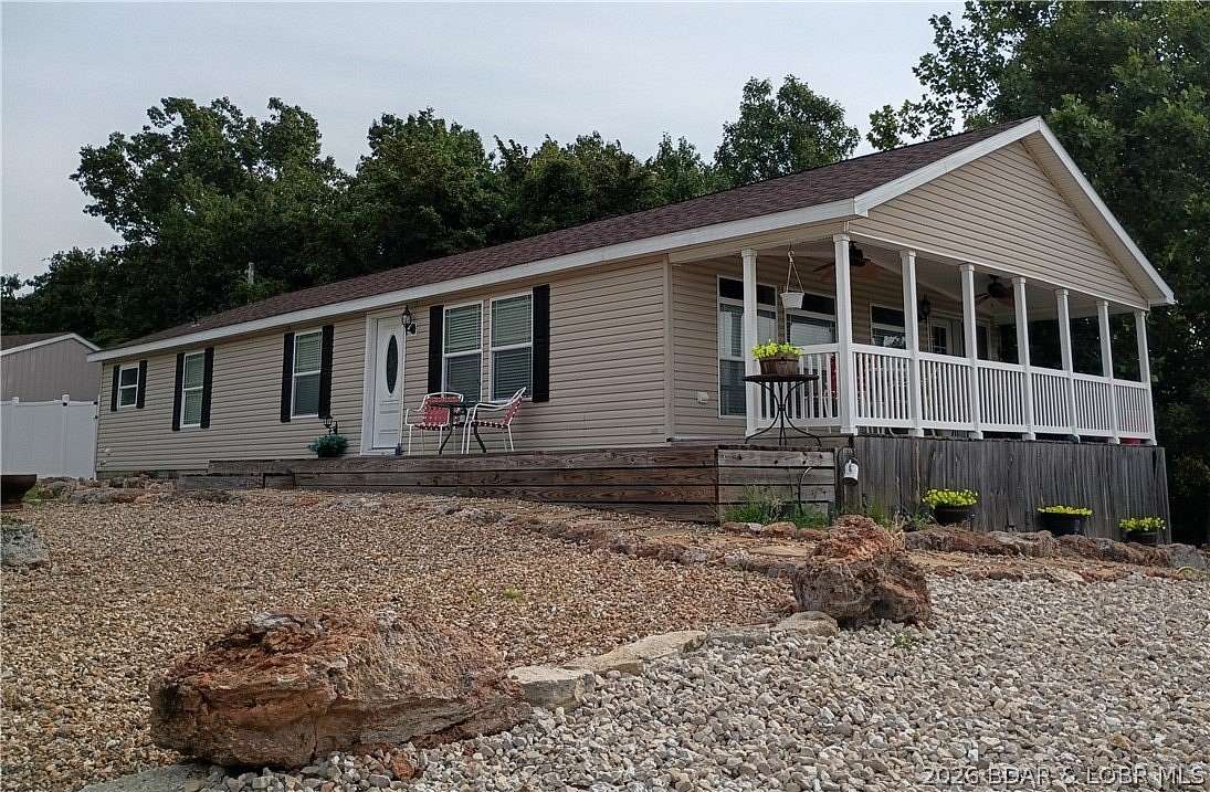 10.1 Acres of Land with Home for Sale in Sunrise Beach, Missouri