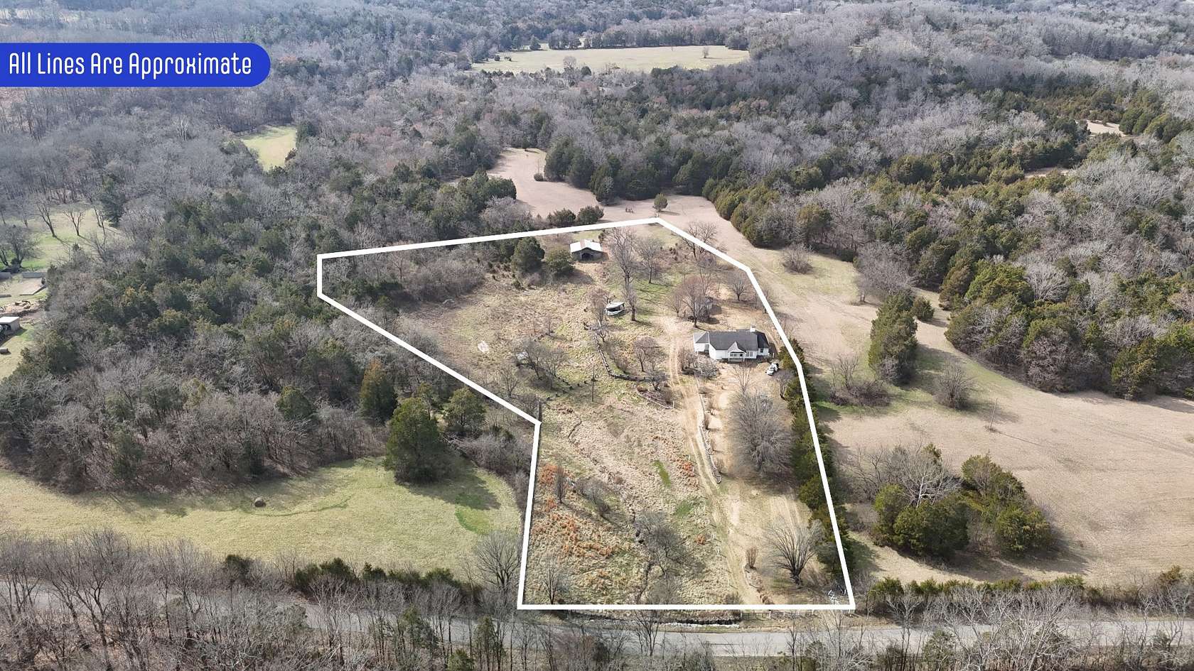 5.16 Acres of Land with Home for Auction in Castalian Springs, Tennessee