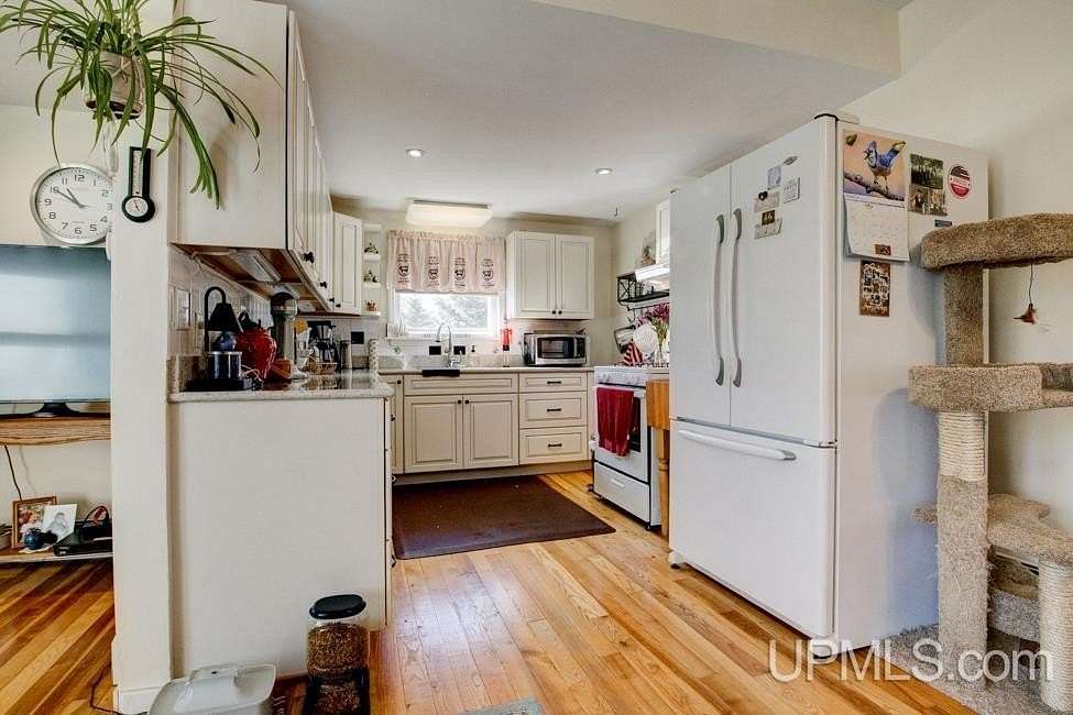 2 Acres of Land with Home for Sale in Daggett, Michigan