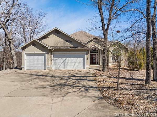 5.26 Acres of Land with Home for Sale in Osage Beach, Missouri