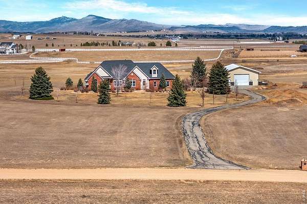 35.6 Acres of Agricultural Land with Home for Sale in Berthoud, Colorado