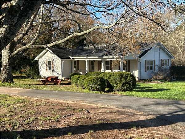 4.47 Acres of Land with Home for Sale in Canton, Georgia