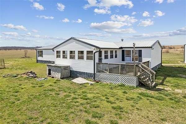 40 Acres of Agricultural Land with Home for Sale in Henryetta, Oklahoma