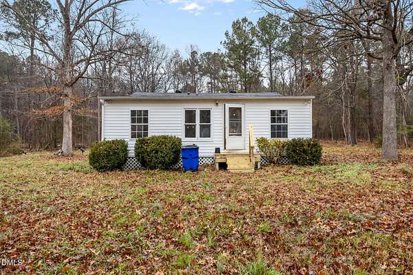 6.77 Acres of Land with Home for Sale in Mebane, North Carolina