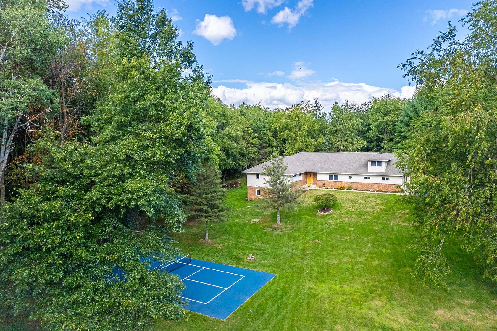 2.78 Acres of Land with Home for Sale in Rockford, Michigan