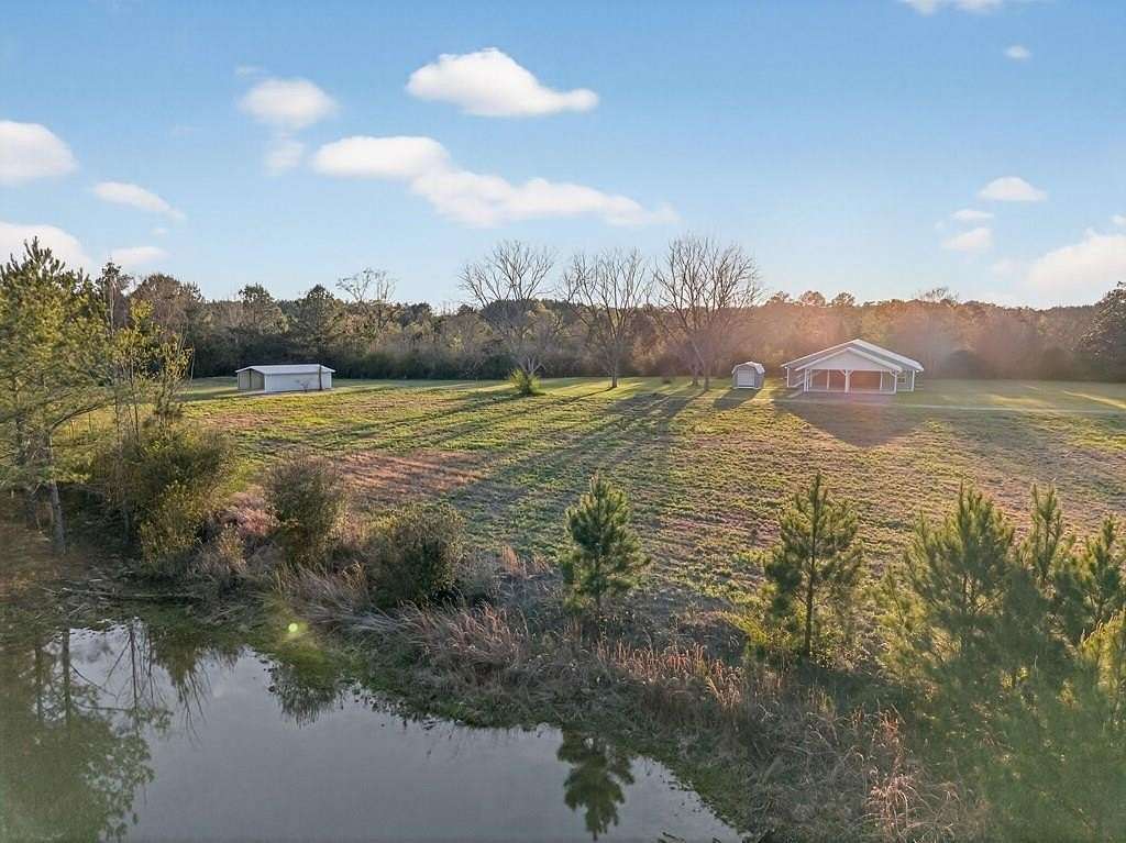 26.1 Acres of Land with Home for Sale in Lumberton, Mississippi