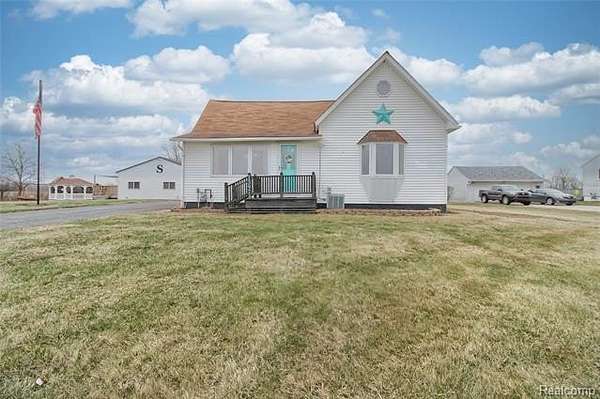 2.6 Acres of Land with Home for Sale in Carleton, Michigan