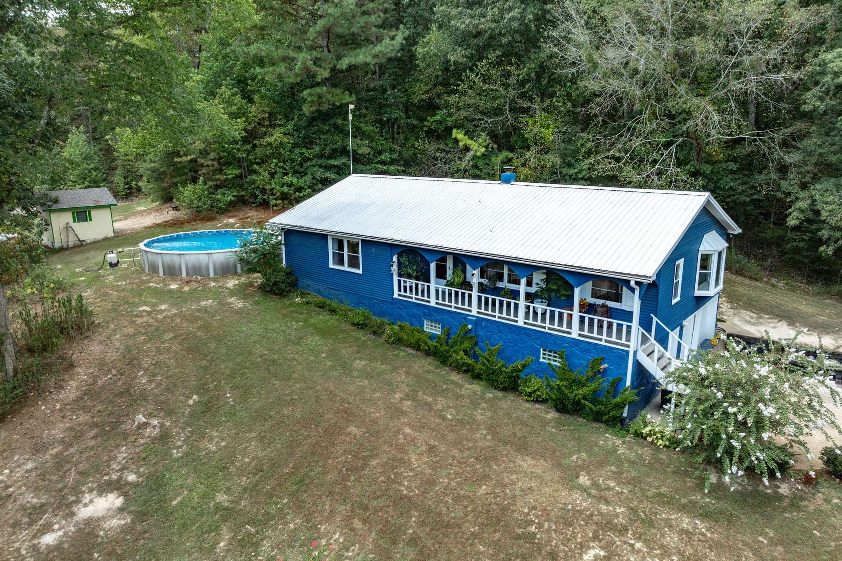 4.74 Acres of Land with Home for Sale in Eva, Tennessee