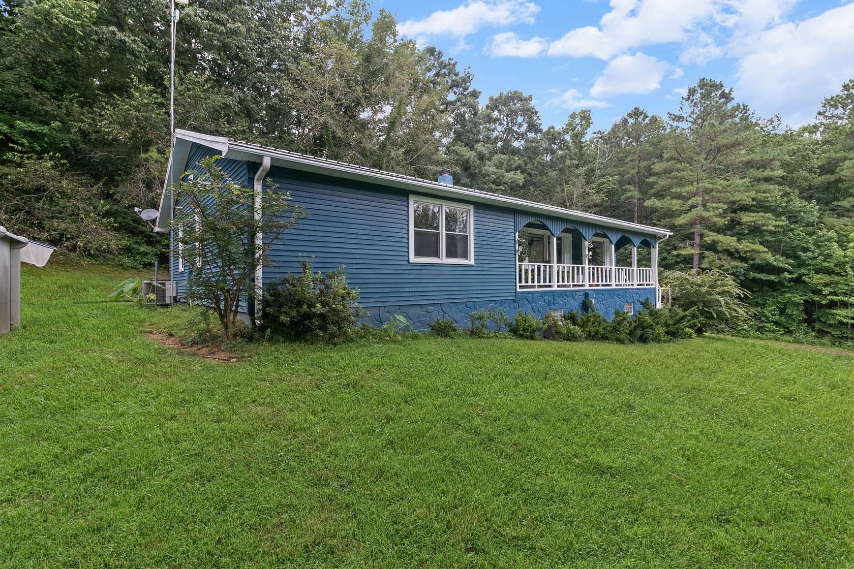 4.74 Acres of Land with Home for Sale in Eva, Tennessee