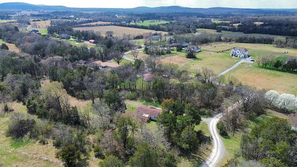 2.46 Acres of Land with Home for Auction in Christiana, Tennessee