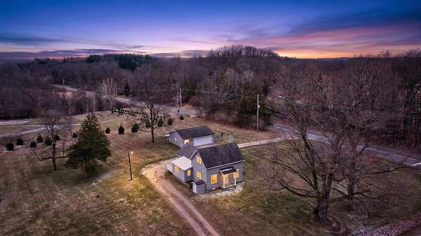 2 Acres of Land with Home for Sale in Clarklake, Michigan