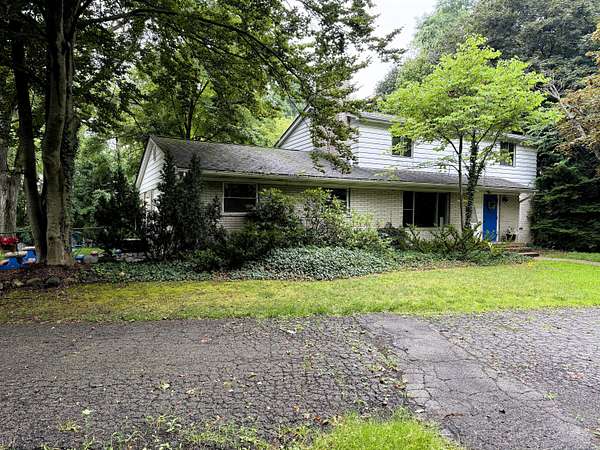 3.88 Acres of Improved Commercial Land for Sale in Brighton, Michigan