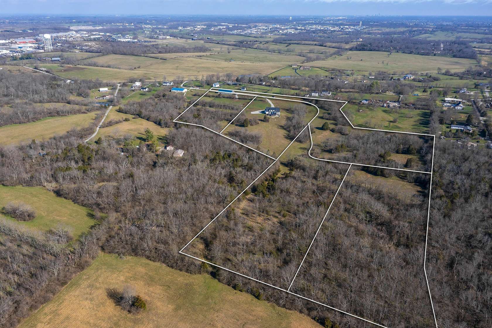 56.7 Acres of Land with Home for Sale in Nicholasville, Kentucky