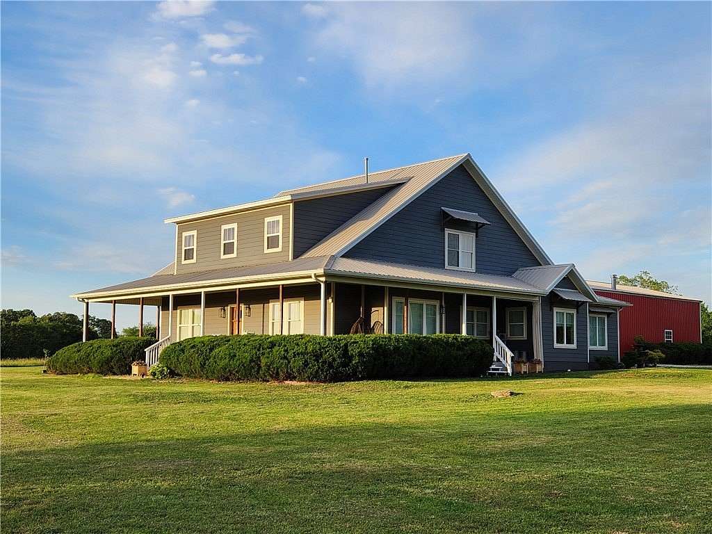 20.1 Acres of Land with Home for Sale in Gentry, Arkansas