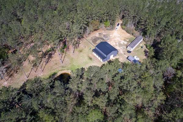 10 Acres of Improved Land for Sale in Kountze, Texas