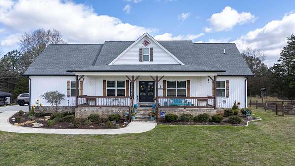 5 Acres of Land with Home for Sale in Ten Mile, Tennessee