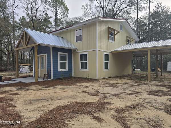 1.64 Acres of Land with Home for Sale in DeFuniak Springs, Florida