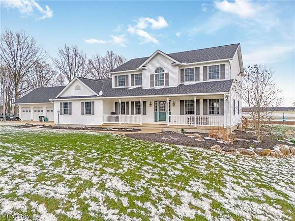 3.63 Acres of Land with Home for Sale in North Lawrence, Ohio