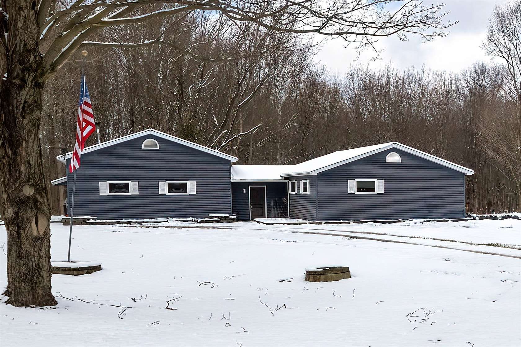 11.4 Acres of Land with Home for Sale in Girard, Pennsylvania