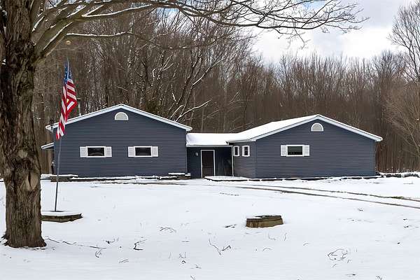 11.4 Acres of Land with Home for Sale in Girard, Pennsylvania