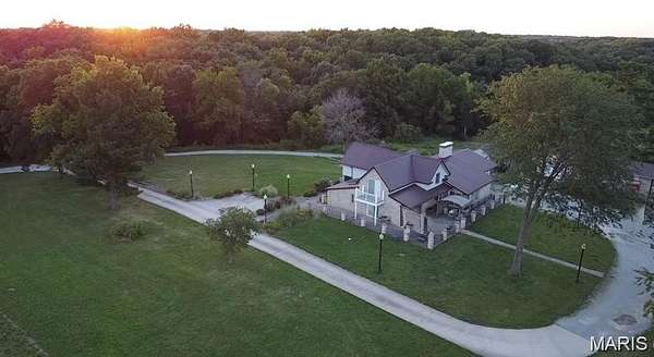 30 Acres of Land with Home for Sale in Center, Missouri