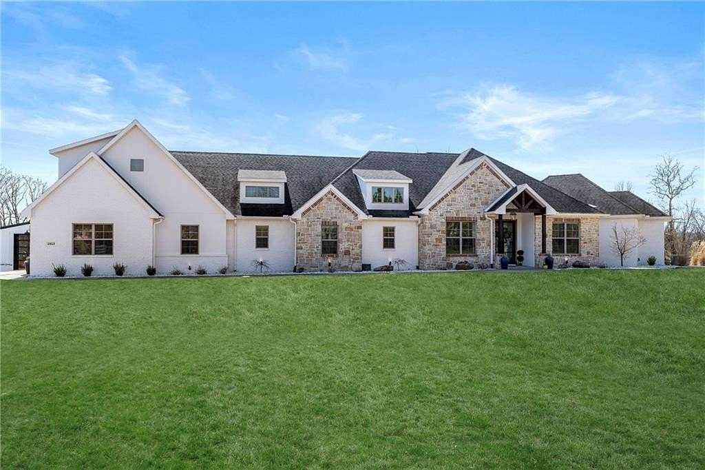 4.55 Acres of Land with Home for Sale in Cave Springs, Arkansas