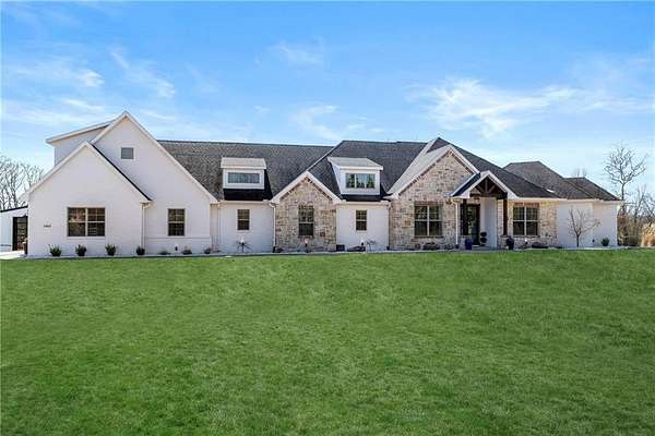 4.55 Acres of Land with Home for Sale in Cave Springs, Arkansas