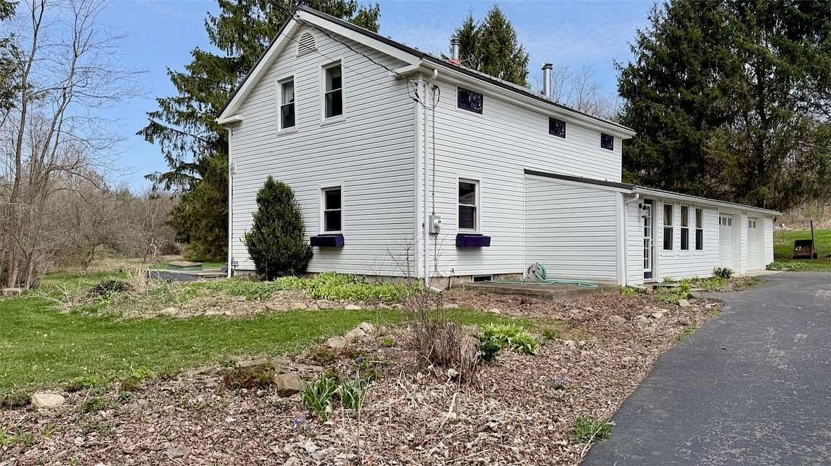 5 Acres of Land with Home for Sale in Locke, New York