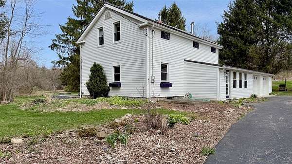 5 Acres of Land with Home for Sale in Locke, New York