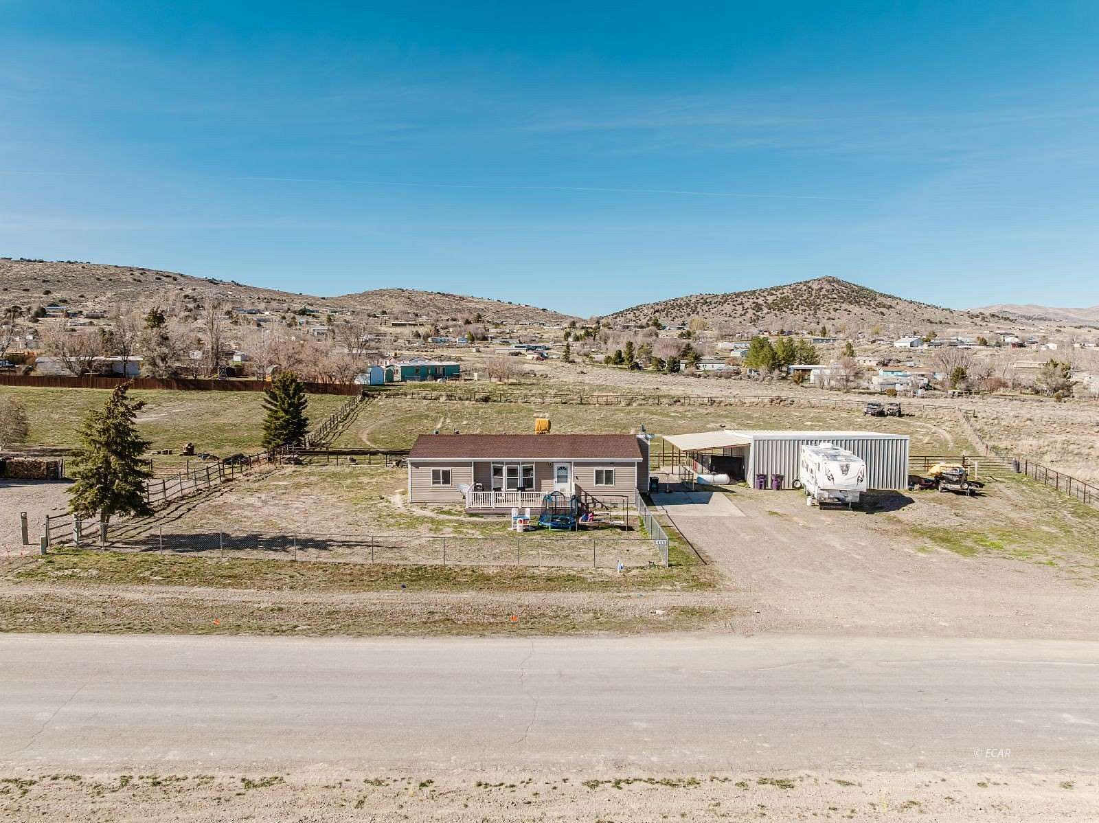 1.6 Acres of Land with Home for Sale in Spring Creek, Nevada