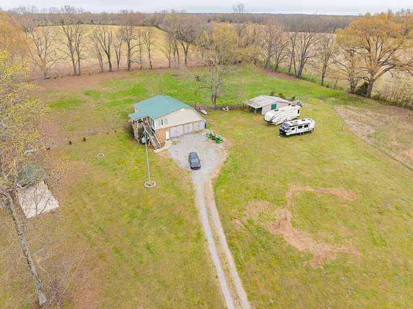 15.3 Acres of Land with Home for Sale in Taft, Tennessee